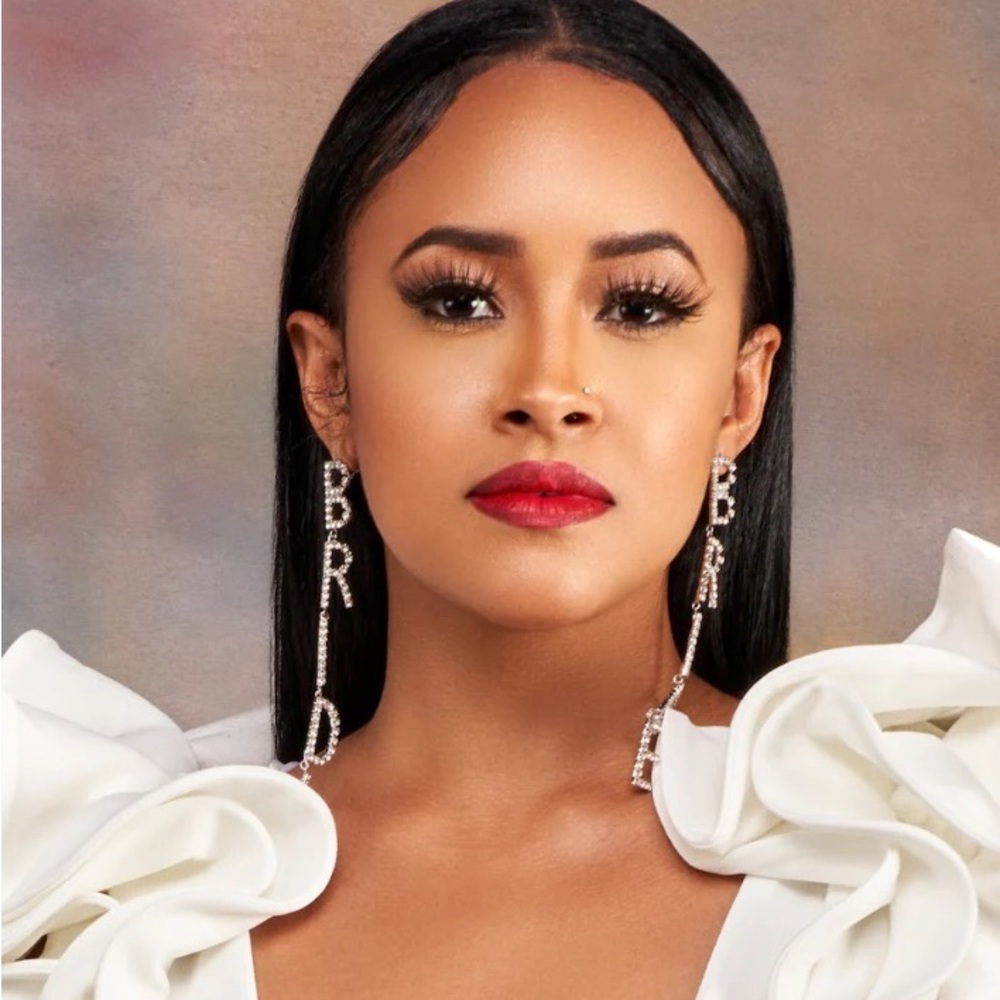 “Bride” drop earrings with rhinestones.